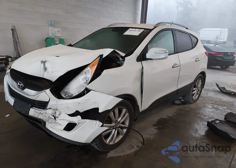 2011 Hyundai Tucson Limited z USA, uszkodzony, nr VIN KM8JUCAC5BU159249